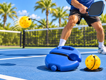 PickleJoy Solo Trainer in use on a pickleball court
